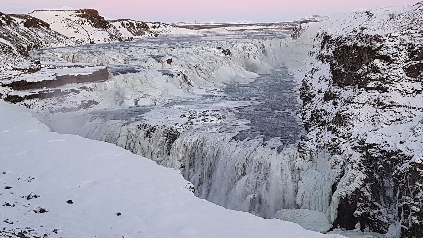 Gullfoss waterfall in winter, edged with ice